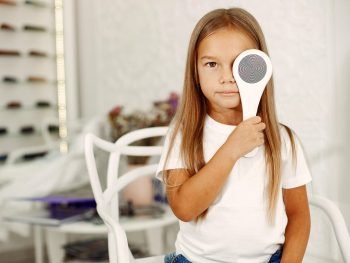 child-eye-test-eye-exam-little-girl-having-eye-check-up-withd-phoropter-eye-test-children